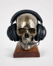 Cold cast bronze skull used as a gaming headset holder